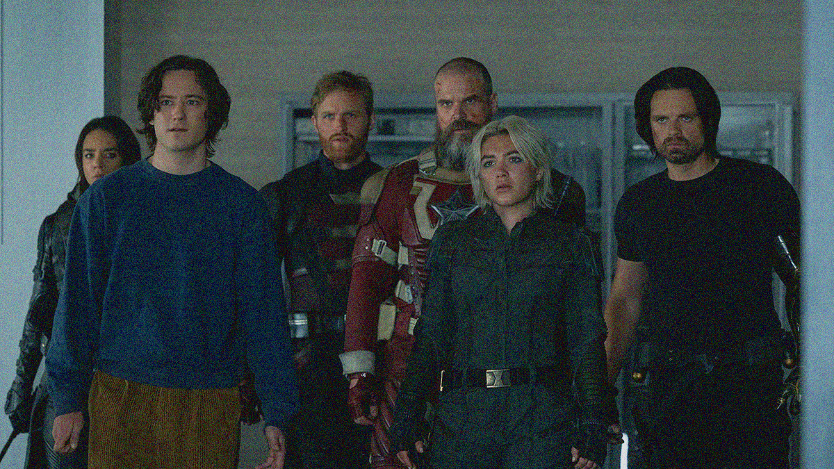 A sextet of people standing in a row staring with a mixture of anger and frustration just slightly off-camera.